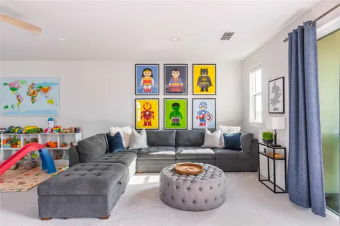 a living room with furniture and a couch
