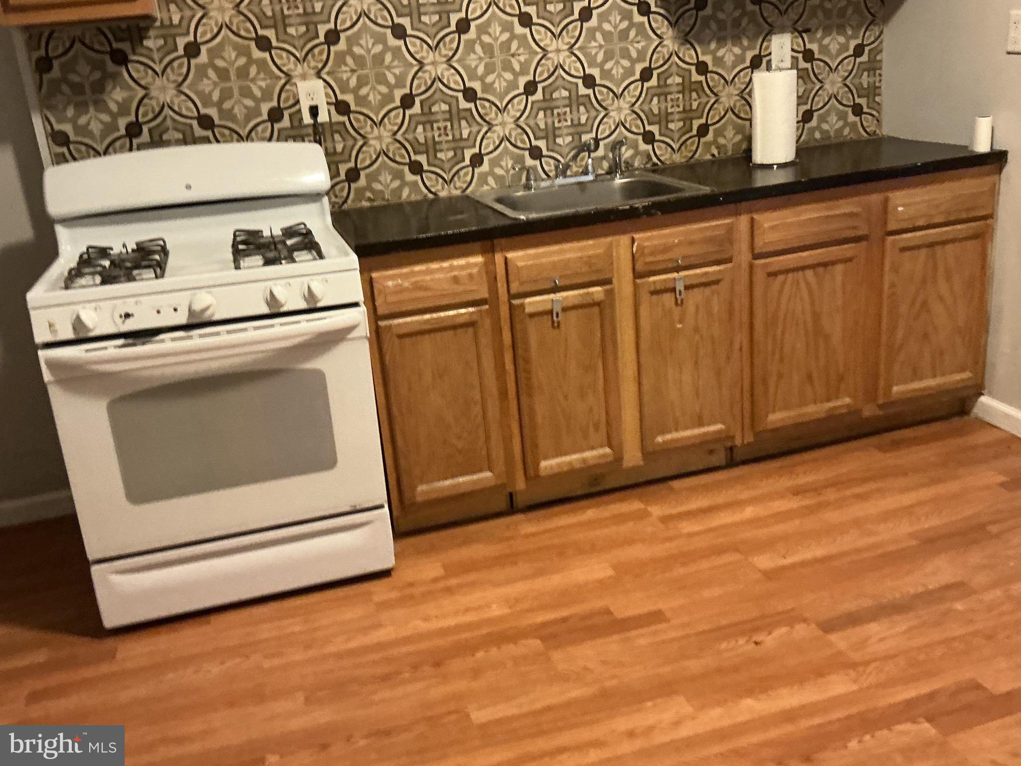 5010 Belair Road Baltimore, MD 21206 - Photo 16 of 24 a utility room with dryer and washer