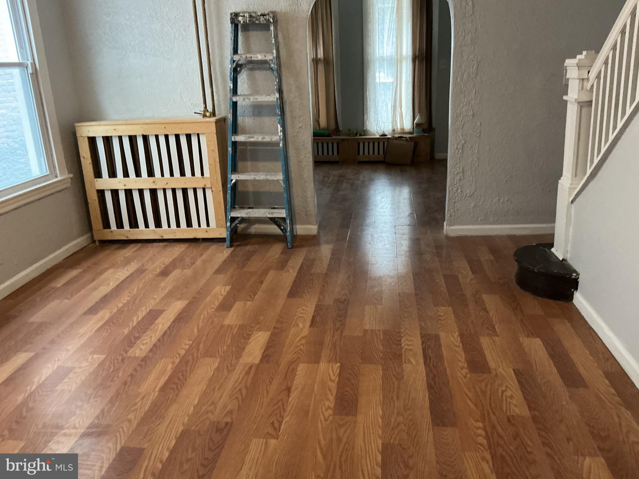 5010 Belair Road Baltimore, MD 21206 - Photo 18 of 24 a view of a room with wooden floor and stairs