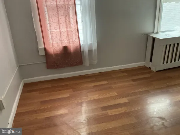 a view of room with window and stairs