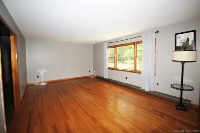 a view of an empty room and window