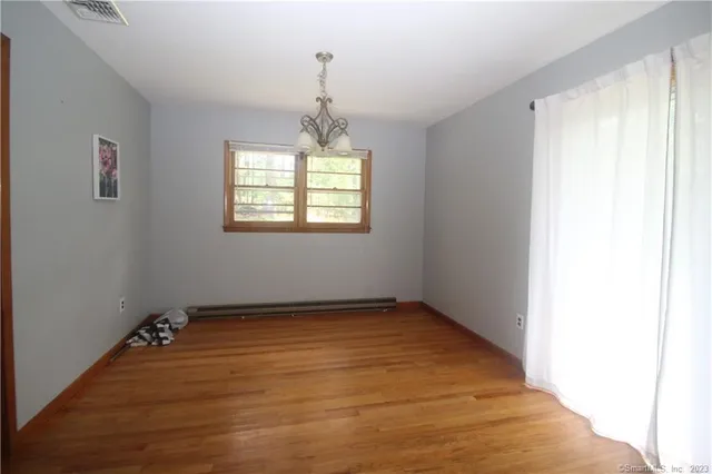 a view of an empty room with window