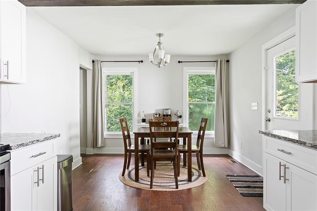 2280 Larchwood Road Southwest Atlanta, GA 30310 - Photo 8 of 20 a view of a dining room with furniture window and outside view