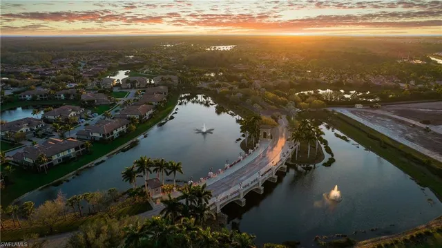 a view of swimming pool with outdoor seating
