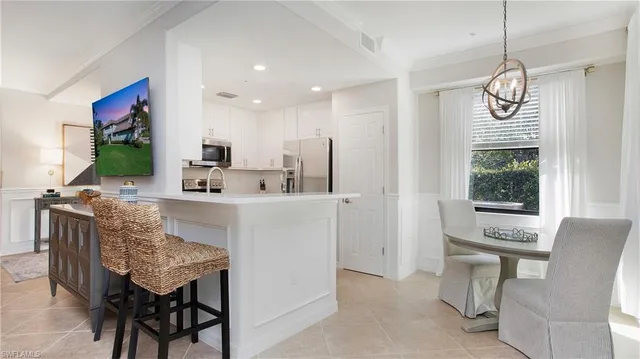 a view of kitchen with furniture and window