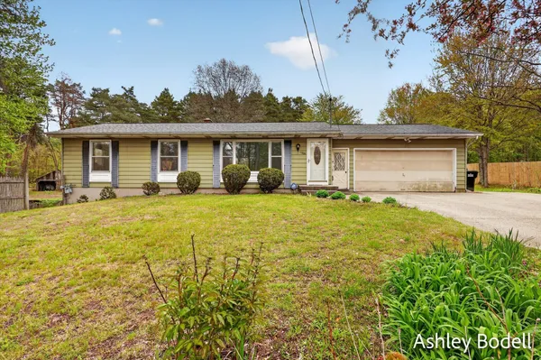 $410,000 | 11888 Long Lake Drive Northwest, Sparta, MI 49345