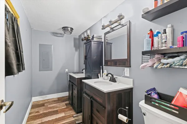 a bathroom with a sink and a mirror