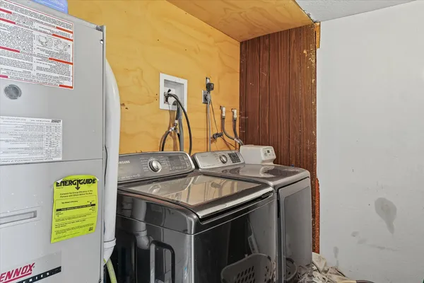 a utility room with dryer and washer