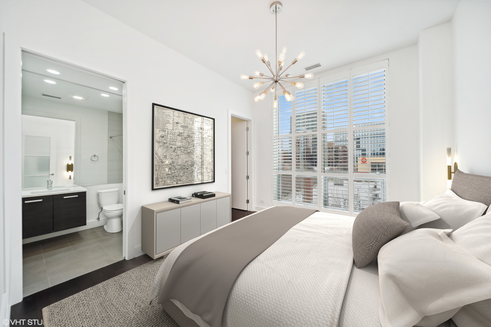 1100 West Adams Street, Unit 4S Chicago, IL 60607 - Photo 16 of 21 a spacious bedroom with a large bed and a window
