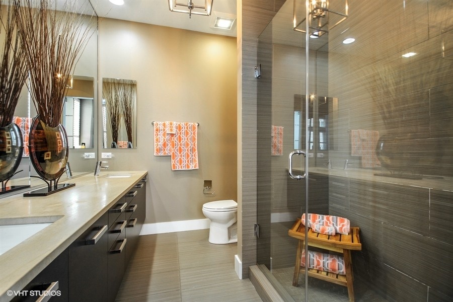 1100 West Adams Street, Unit 4S Chicago, IL 60607 - Photo 20 of 21 a bathroom with a sink a toilet and a shower