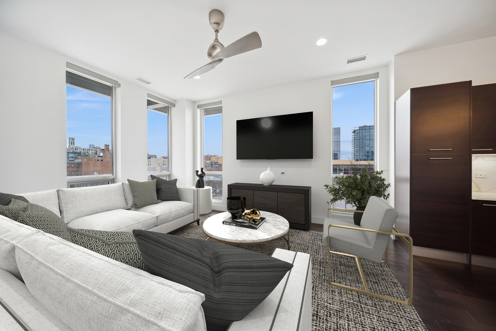 1100 West Adams Street, Unit 4S Chicago, IL 60607 - Photo 4 of 21 a living room with furniture a fireplace and a flat screen tv