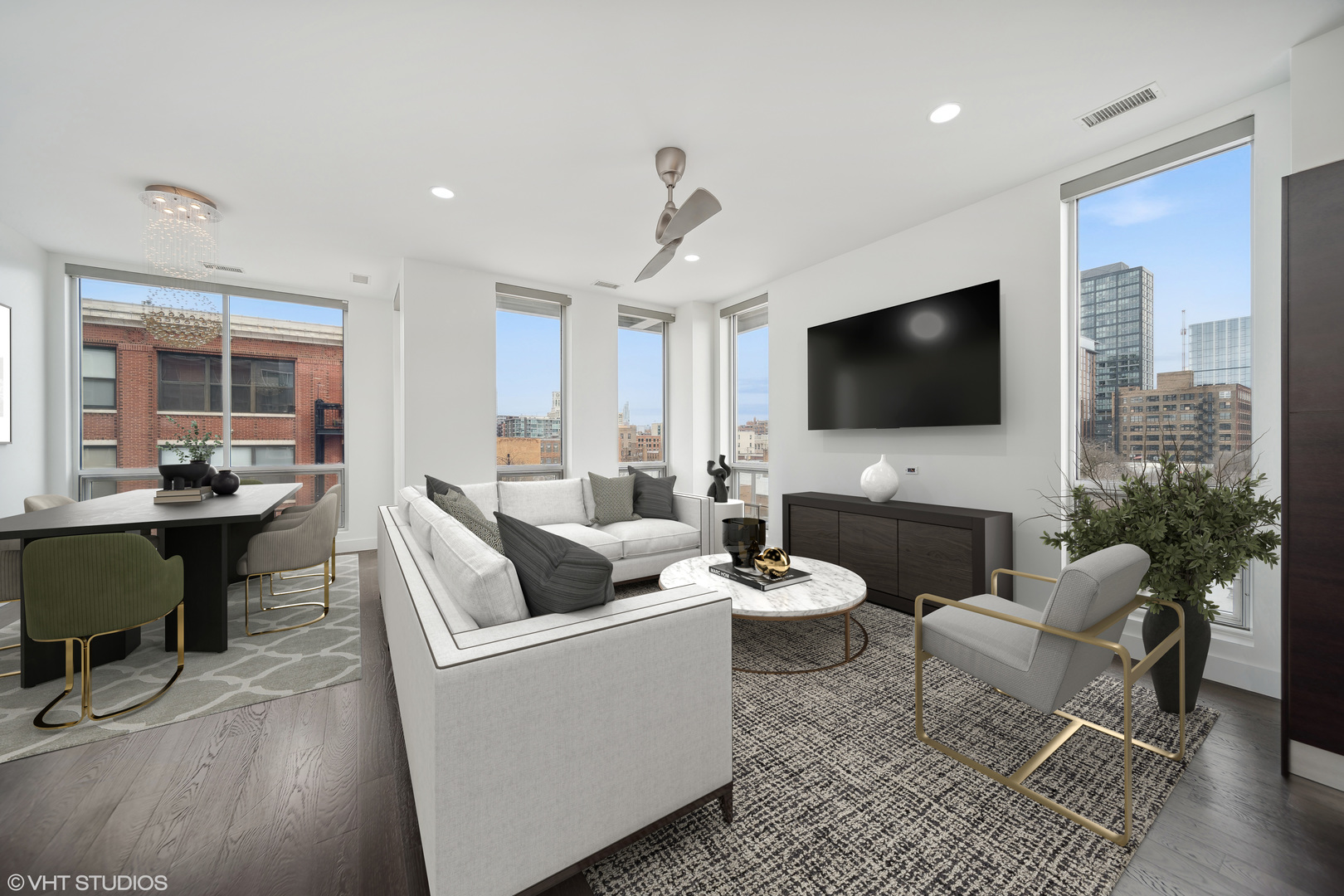 1100 West Adams Street, Unit 4S Chicago, IL 60607 - Photo 7 of 21 a living room with furniture and a flat screen tv