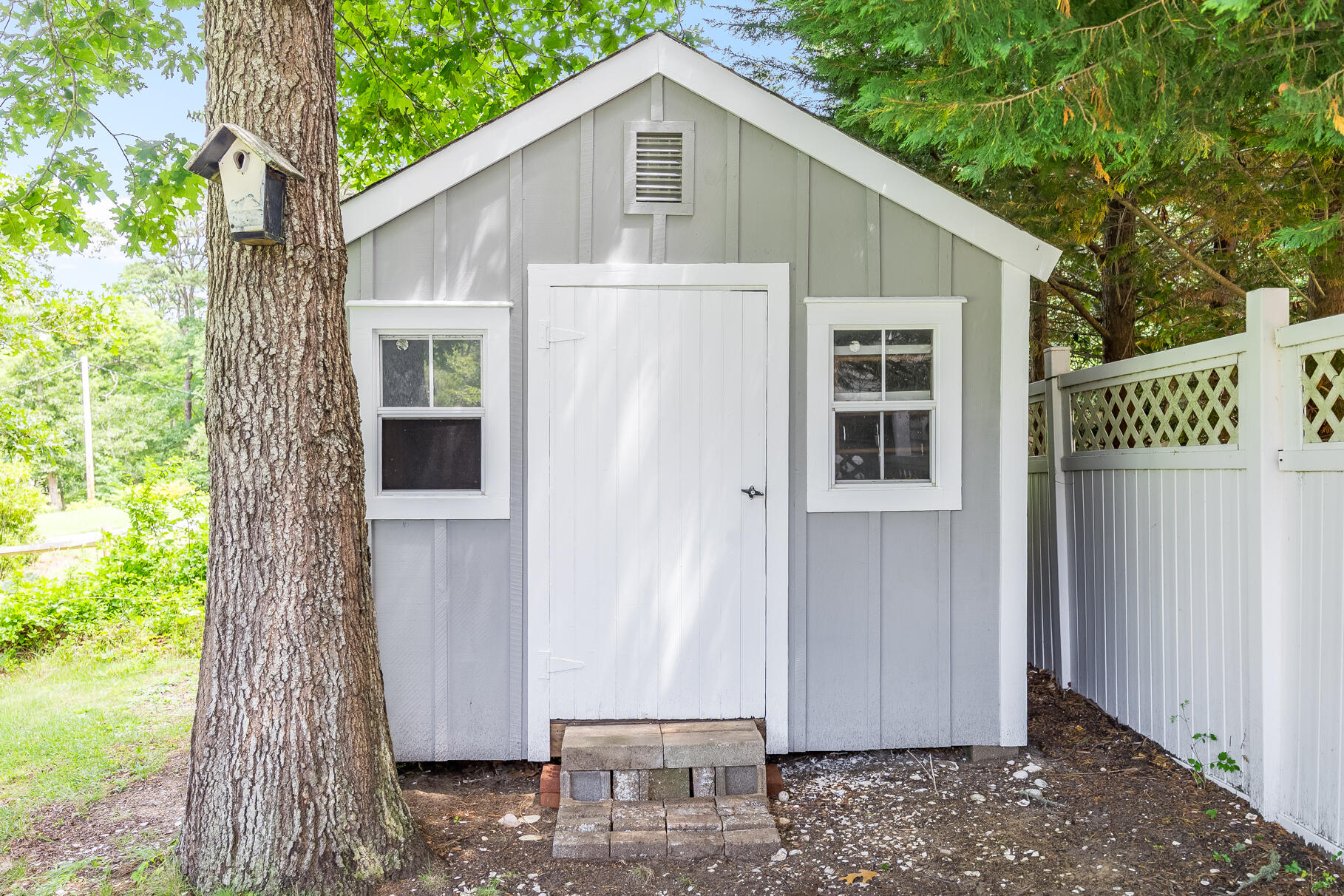510 Hay Road Eastham, MA 02642 - Photo 24 of 34 a front view of a house with garden