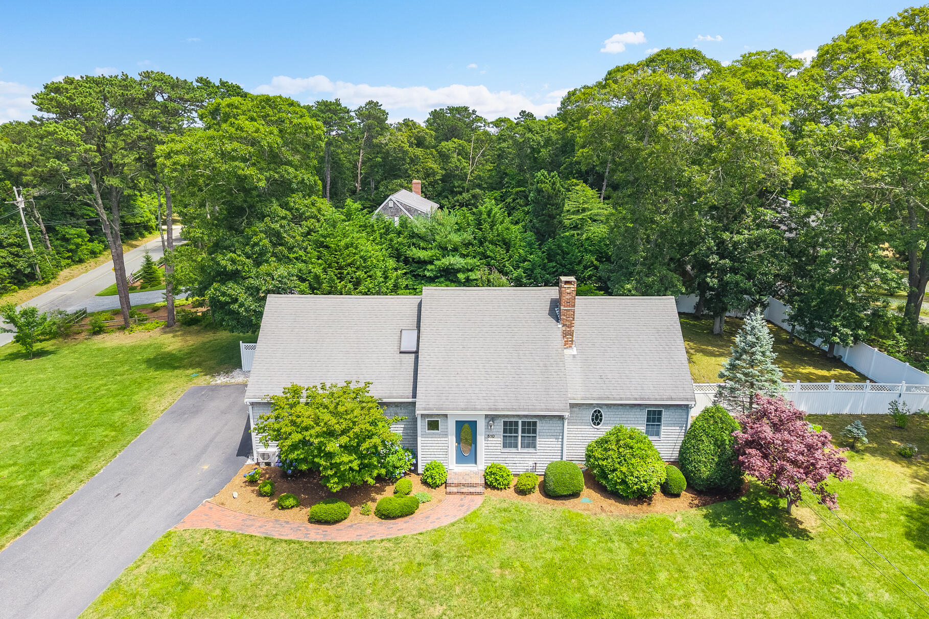 510 Hay Road Eastham, MA 02642 - Photo 27 of 34 an aerial view of a house with a garden and lake view