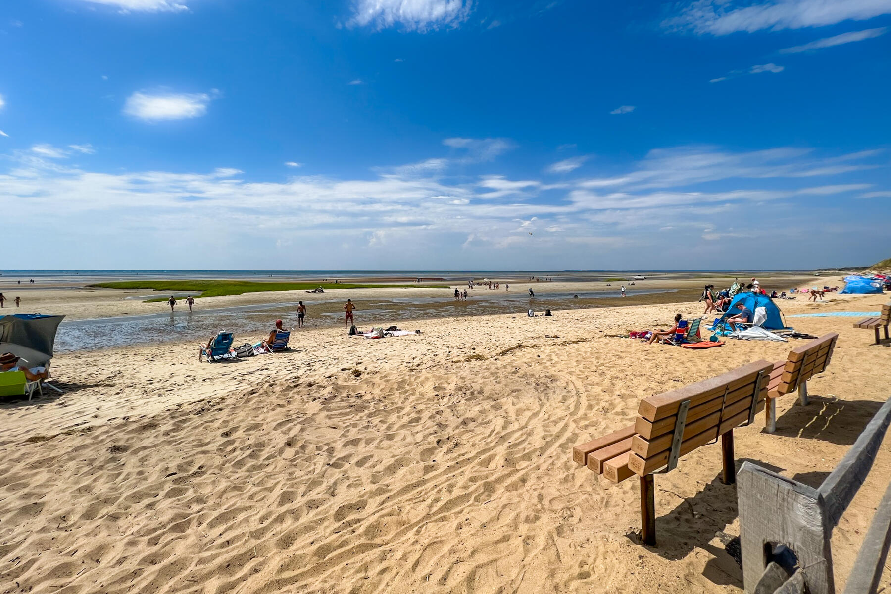 510 Hay Road Eastham, MA 02642 - Photo 30 of 34 a view of a terrace with a table and chairs under an umbrella