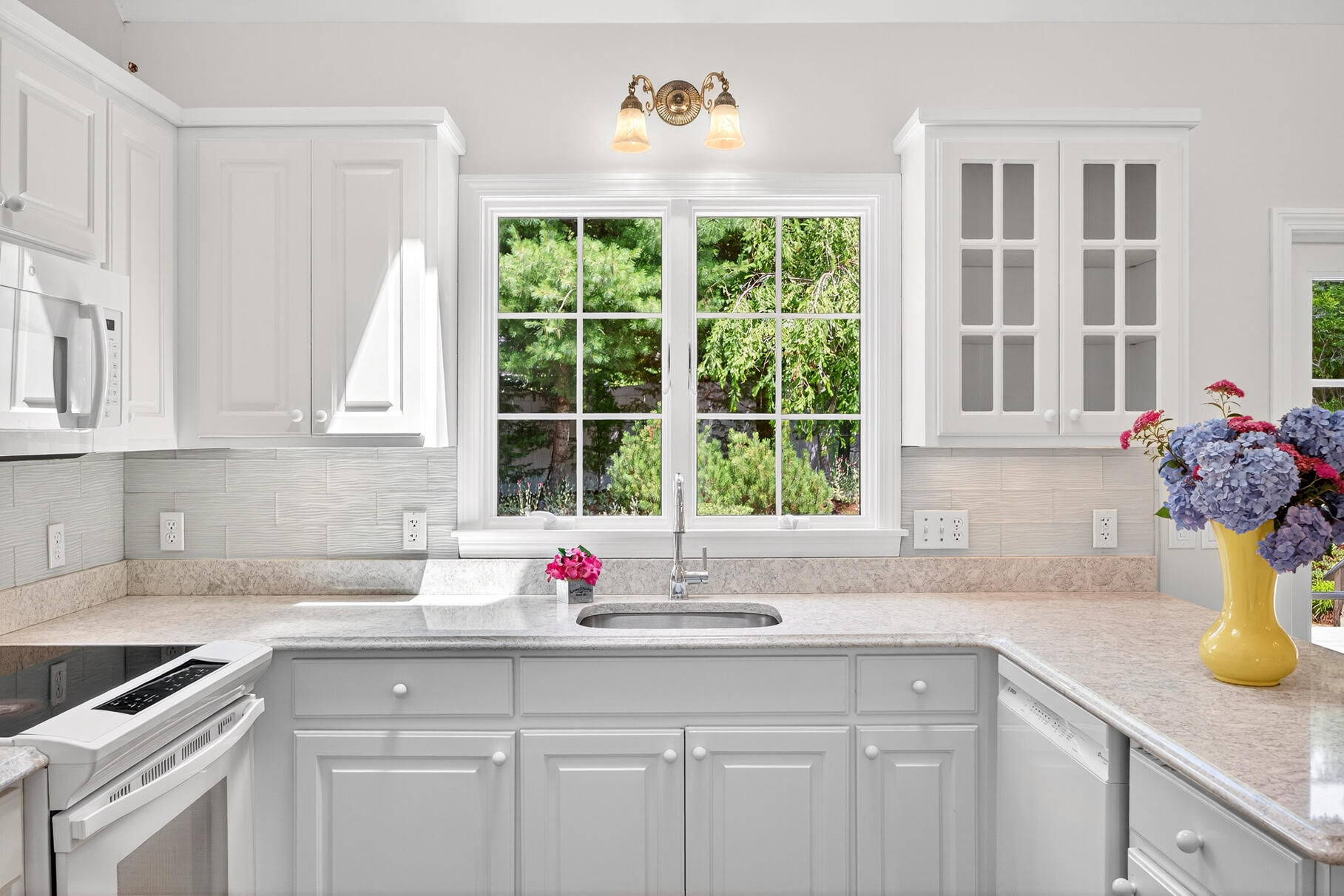 510 Hay Road Eastham, MA 02642 - Photo 6 of 34 a kitchen with a sink and cabinets