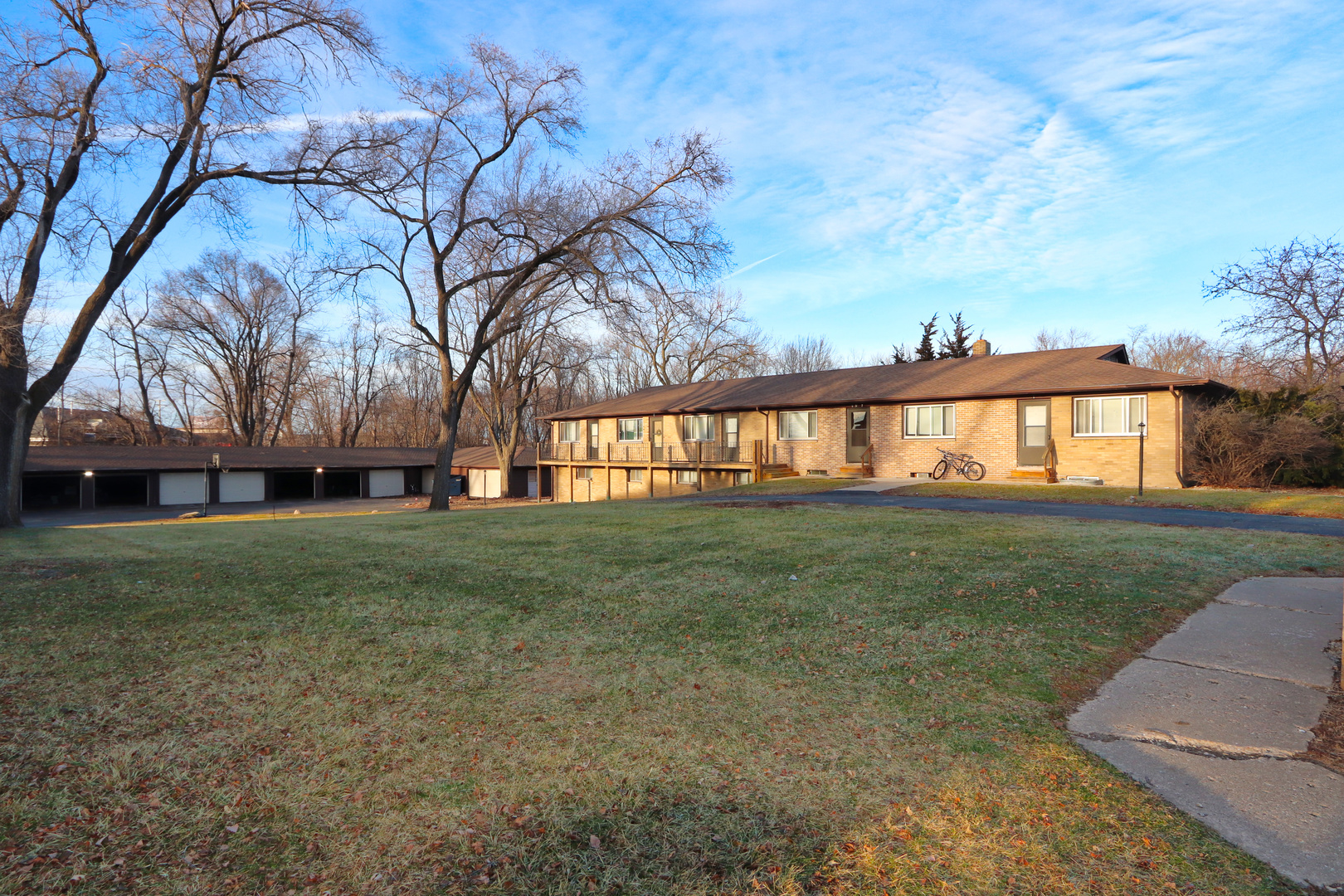 322 Maple Drive, Unit 2B Morris, IL 60450 - Photo 12 of 13 a view of yard with a house in the background