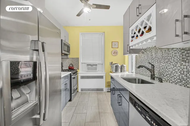 a view of a dining area with furniture and a window