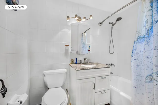 a kitchen with a sink and refrigerator