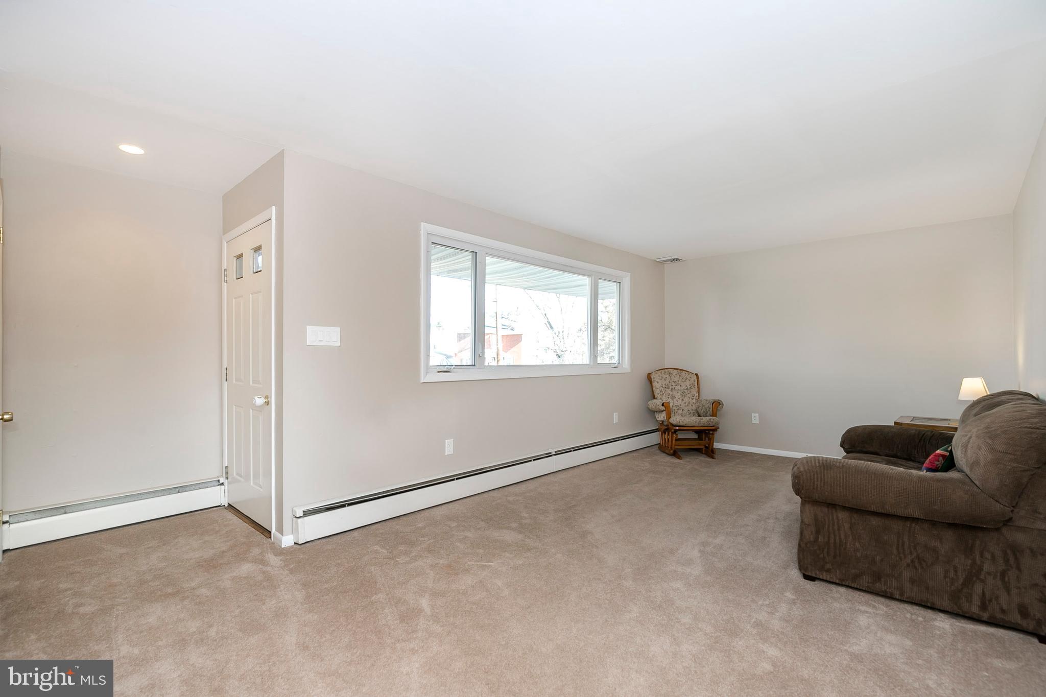 90 Moser Road Pottstown, PA 19464 - Photo 2 of 26 Living room with outside access