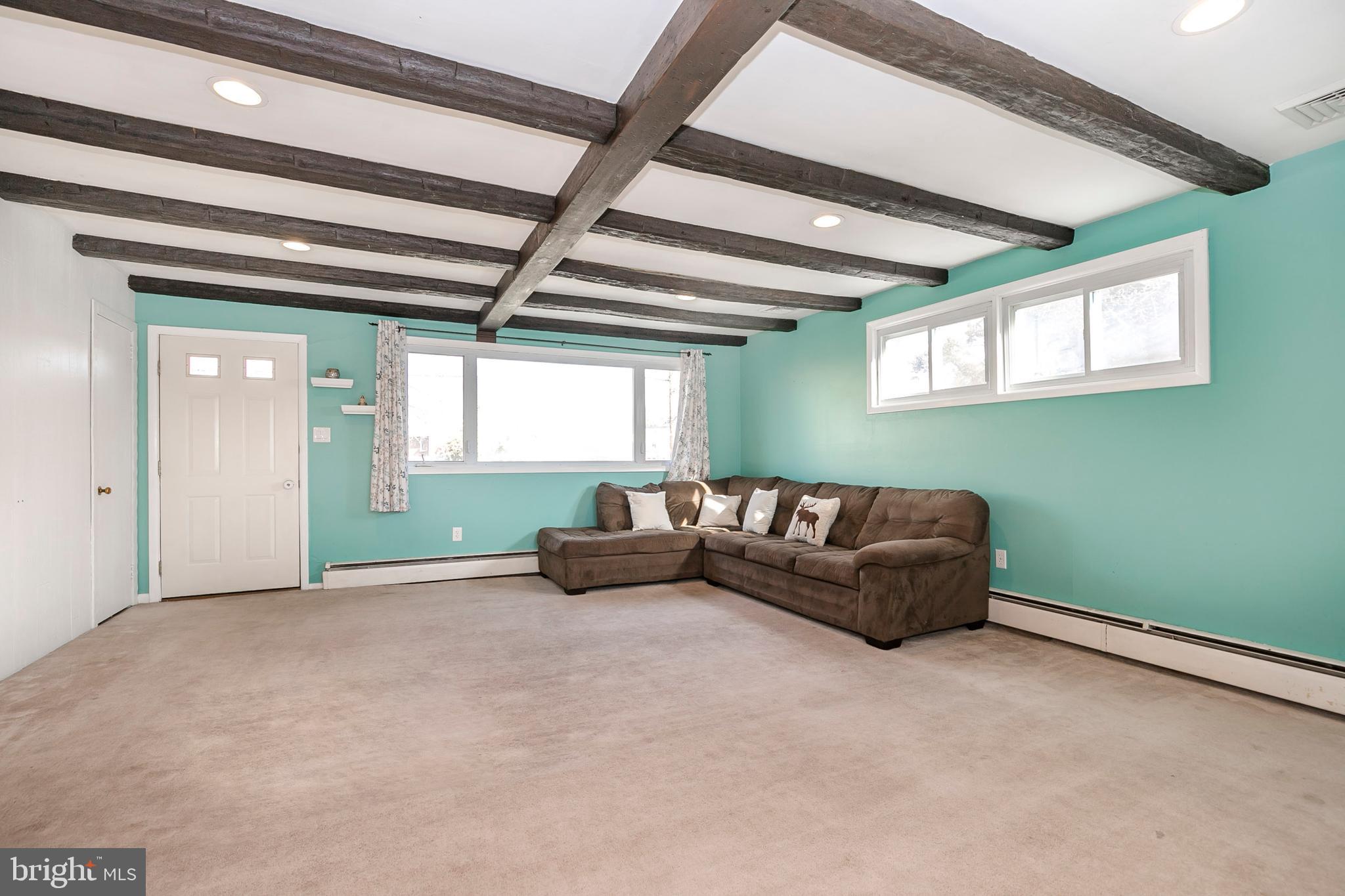 90 Moser Road Pottstown, PA 19464 - Photo 14 of 26 Family room with outside access