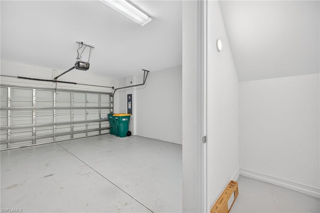 7570 Rockefeller Drive Naples, FL 34119 - Photo 23 of 34 a view of a garage