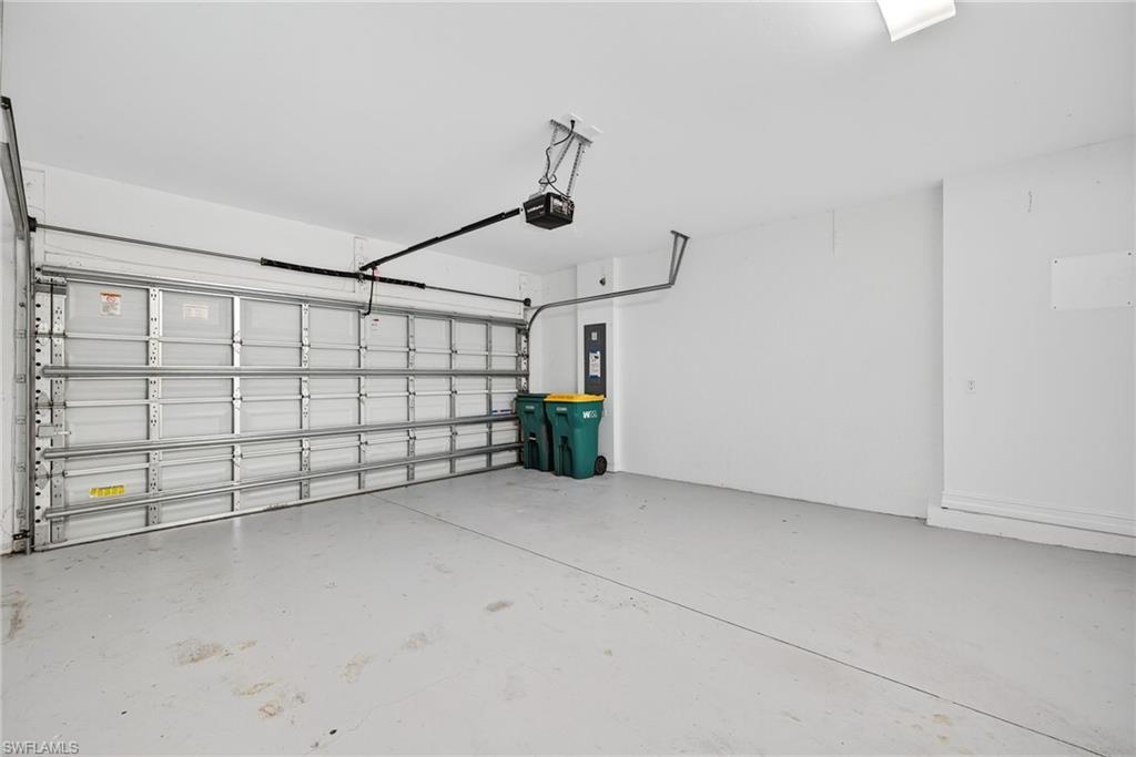 7570 Rockefeller Drive Naples, FL 34119 - Photo 24 of 34 a view of a garage