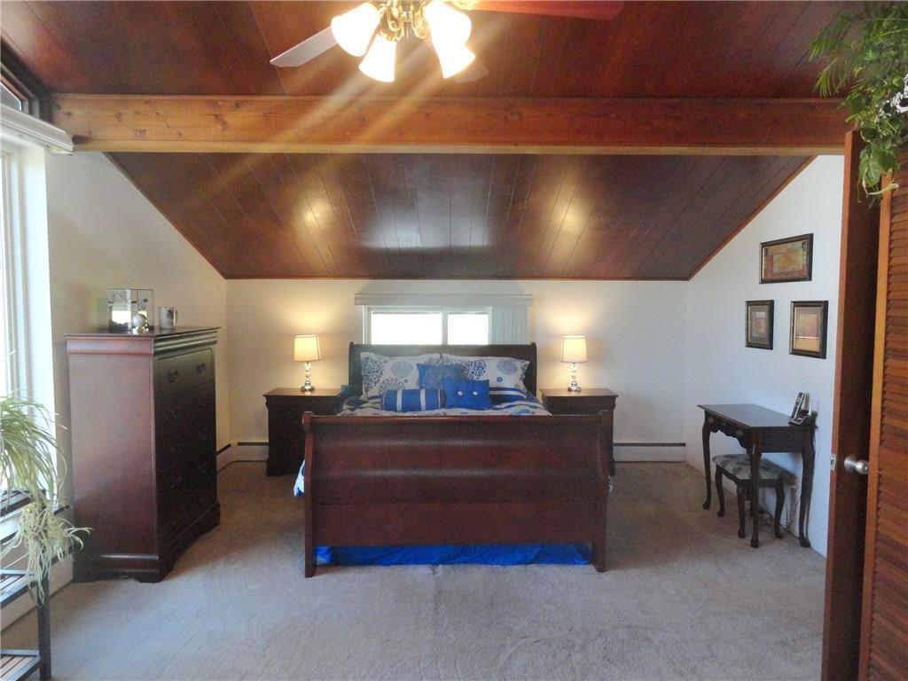 734 Field Club Road Pittsburgh, PA 15238 - Photo 19 of 25 GENEROUSLY SIZED MASTER BEDROOM AWASH IN NATURAL LIGHT.