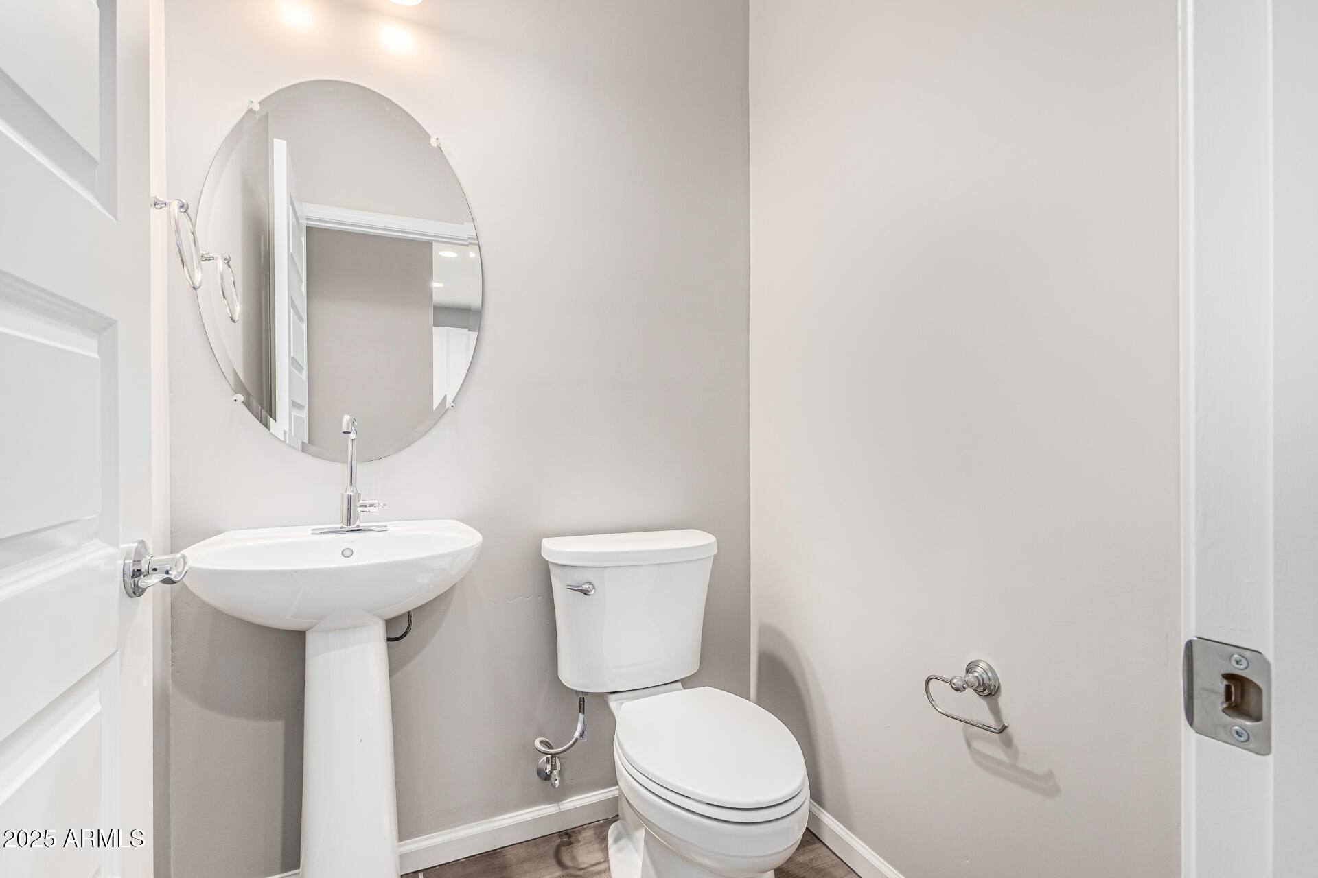 733 East Commonwealth Avenue, Unit 36 Chandler, AZ 85225 - Photo 13 of 30 a bathroom with a toilet sink and mirror