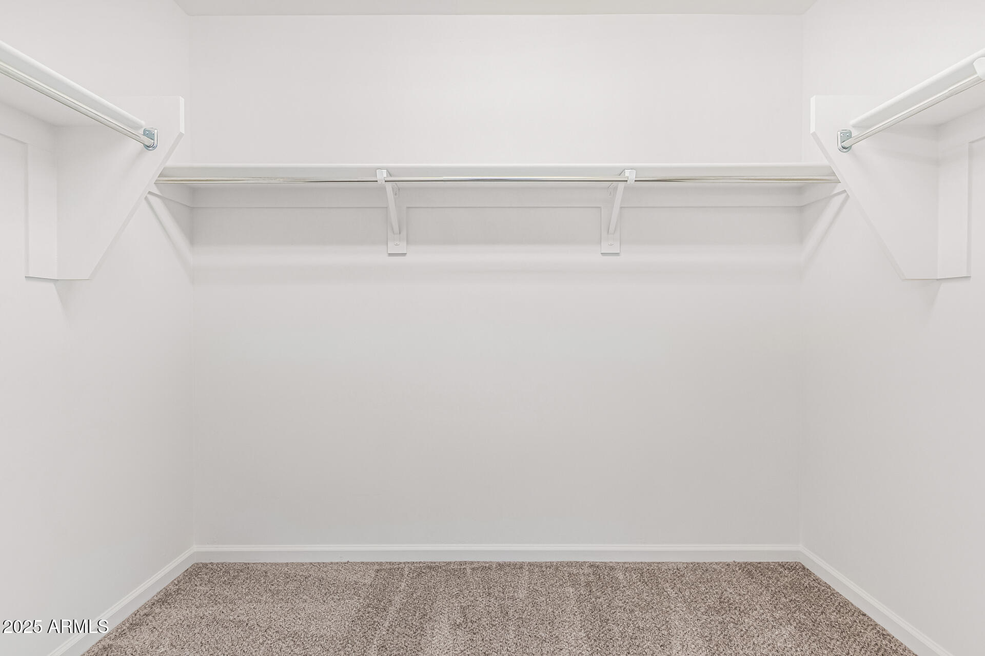 733 East Commonwealth Avenue, Unit 36 Chandler, AZ 85225 - Photo 18 of 30 a view of a room with racks on the wall