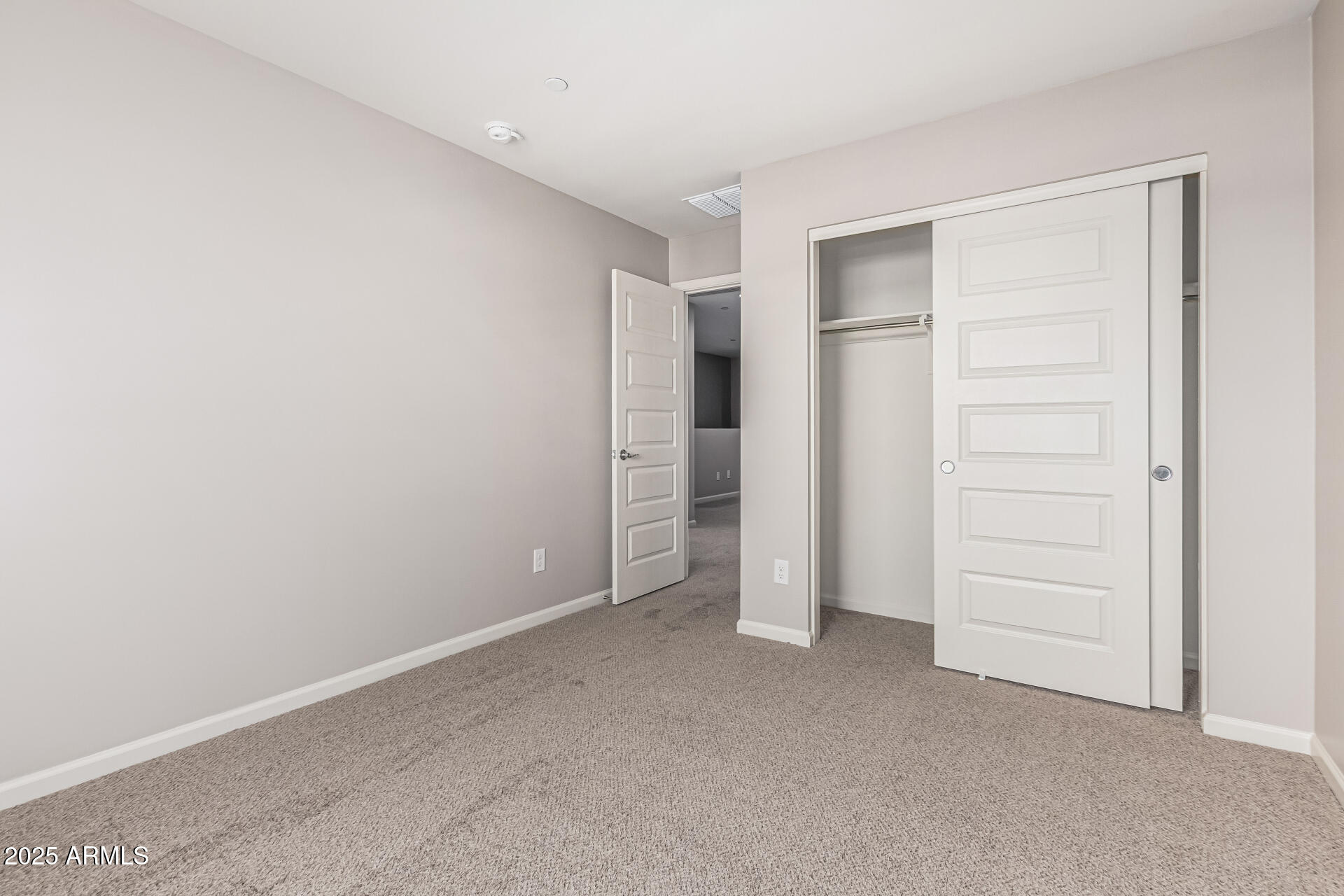 733 East Commonwealth Avenue, Unit 36 Chandler, AZ 85225 - Photo 22 of 30 wooden floor and closet in a room