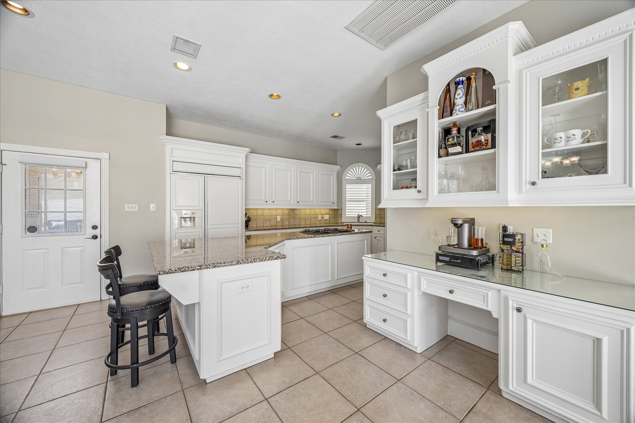 16407 Emilia Court Spring, TX 77379 - Photo 15 of 35 This kitchen has space for that coffee bar or to use as butler's pantry area!