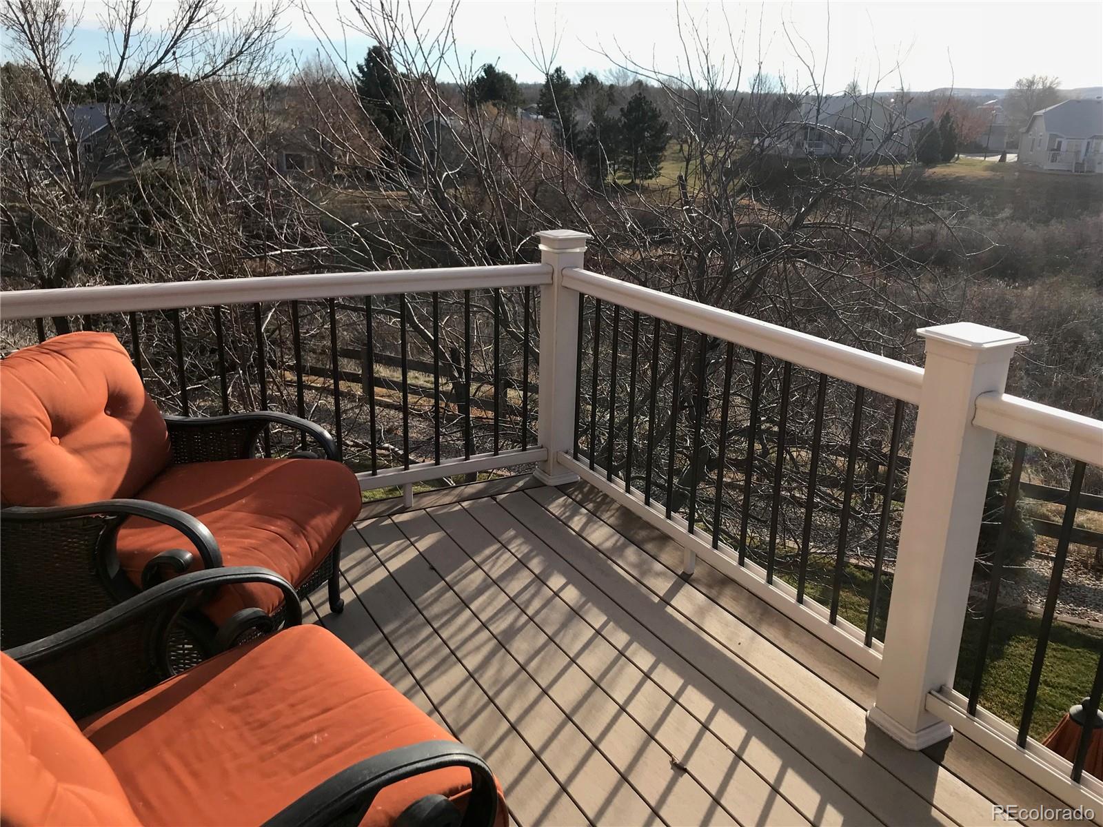 8952 Tuscany Lane Highlands Ranch, CO 80130 - Photo 17 of 32 a view of balcony with furniture