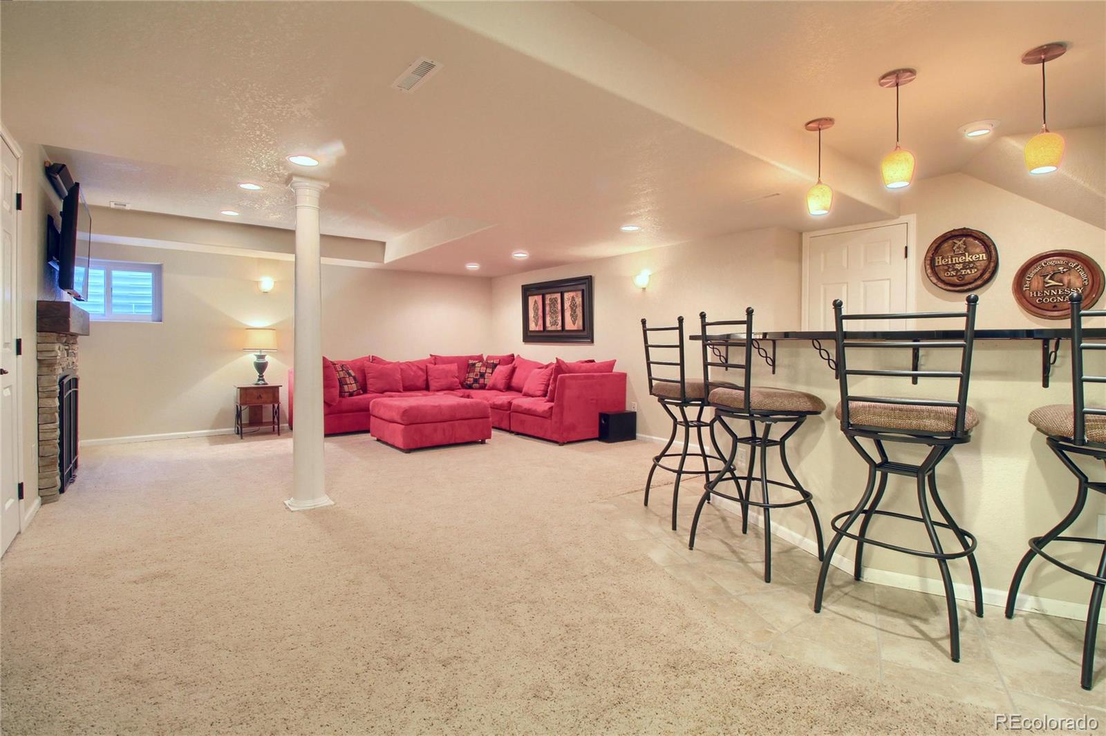 8952 Tuscany Lane Highlands Ranch, CO 80130 - Photo 22 of 32 a bedroom with furniture and a air conditioner vent