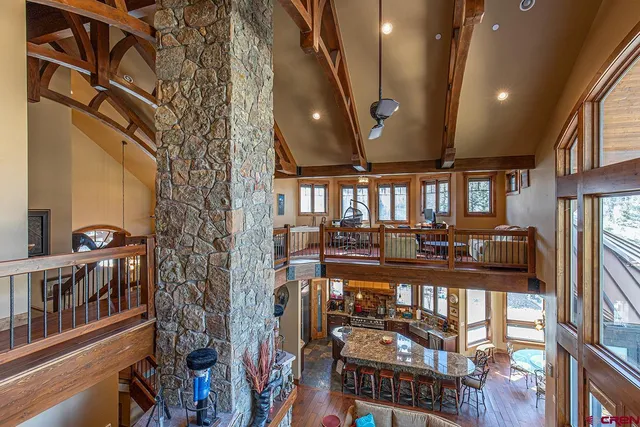 a view of a entryway with furniture and floor to ceiling window