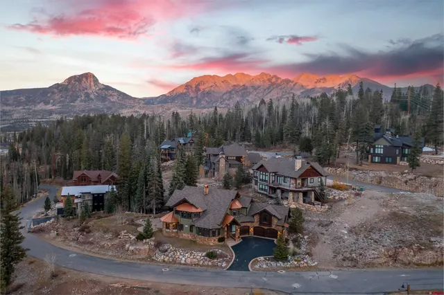 a view of a town with couple of trees