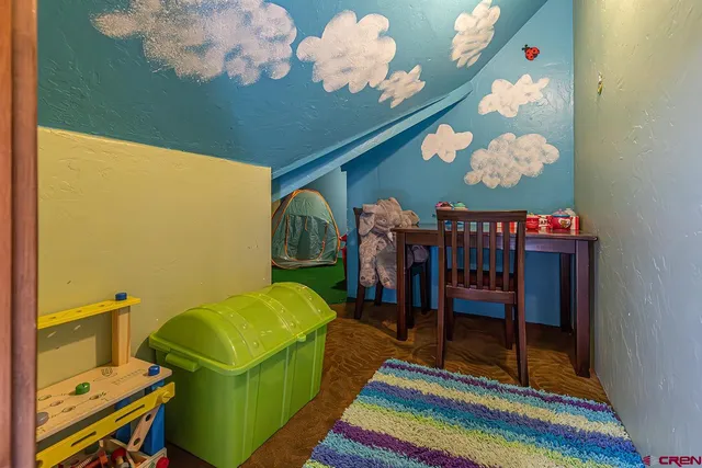 a room with musical instruments and air hockey table
