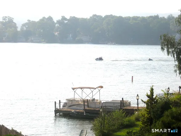 a view of a roof deck with couches