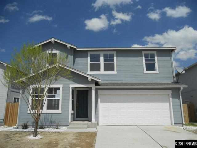 7727 Corso Street Reno, NV 89506 - Photo 1 of 1 a front view of a house with a yard