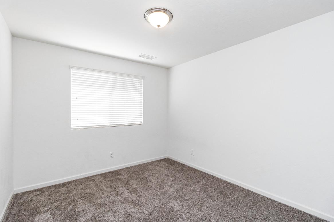 3759 Highpark Way Clovis, CA 93619 - Photo 18 of 32 an empty room with a window