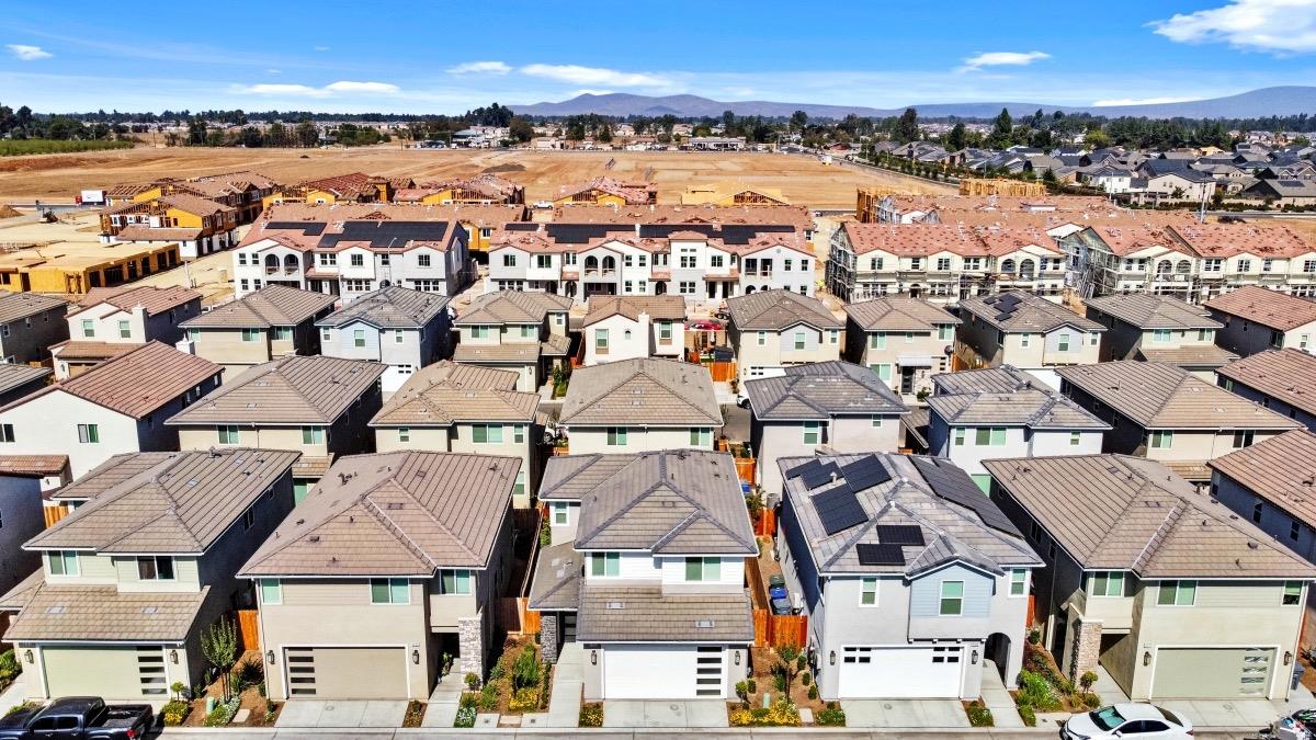 3759 Highpark Way Clovis, CA 93619 - Photo 32 of 32 an aerial view of residential houses with outdoor space and ocean view