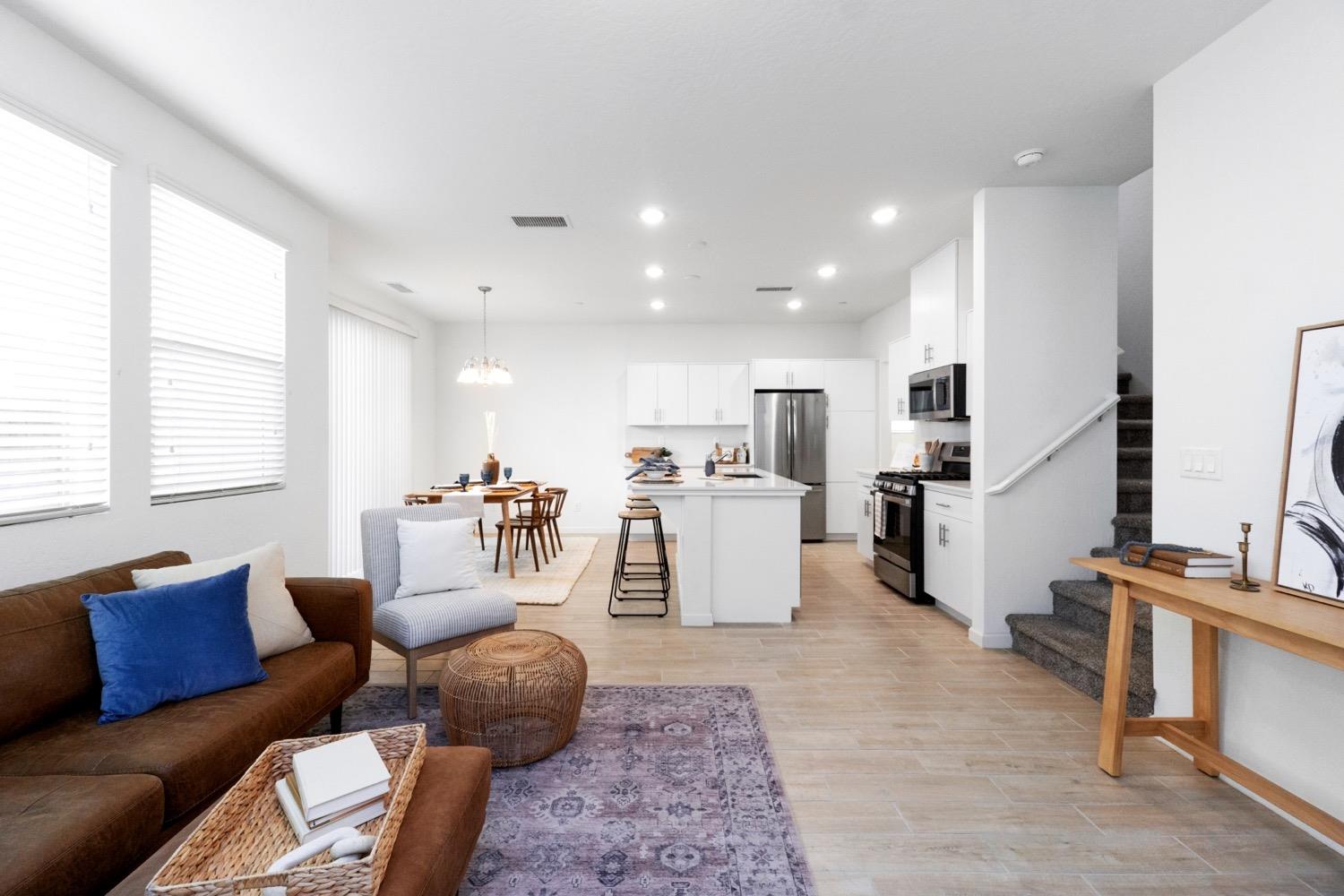 3759 Highpark Way Clovis, CA 93619 - Photo 8 of 32 a living room with furniture and a large window