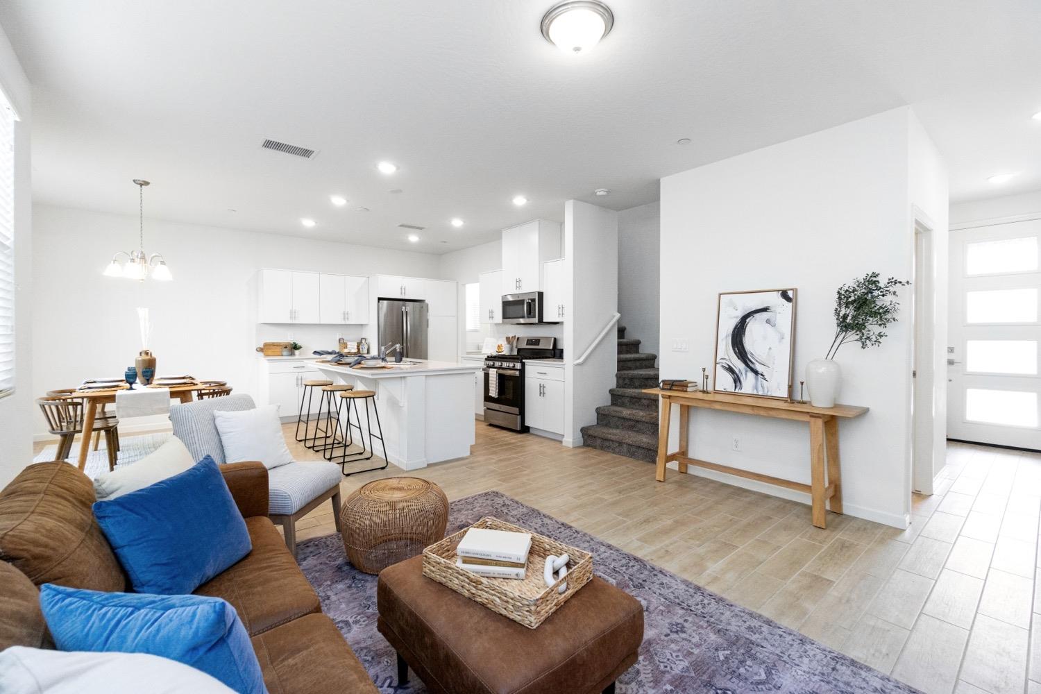 3759 Highpark Way Clovis, CA 93619 - Photo 9 of 32 a living room with furniture and kitchen view