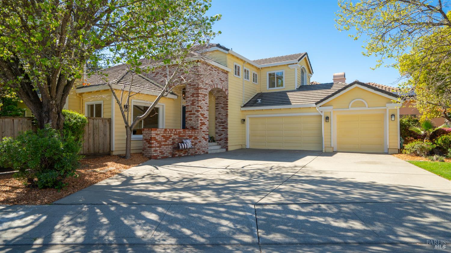 15 Vincent Lane Novato, CA 94945 - Photo 1 of 1 a front view of a house with a yard and garage