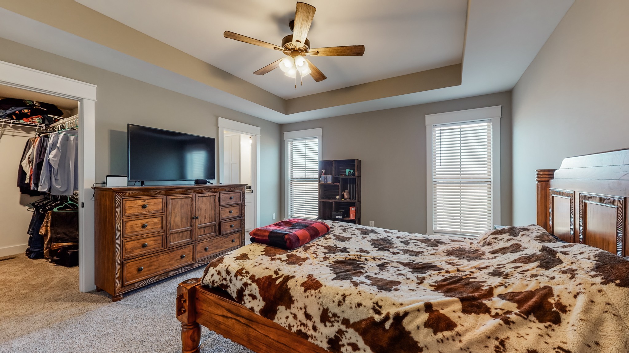 732 White Road Portland, TN 37148 - Photo 42 of 55 a bedroom with a bed and a flat tv screen on dresser