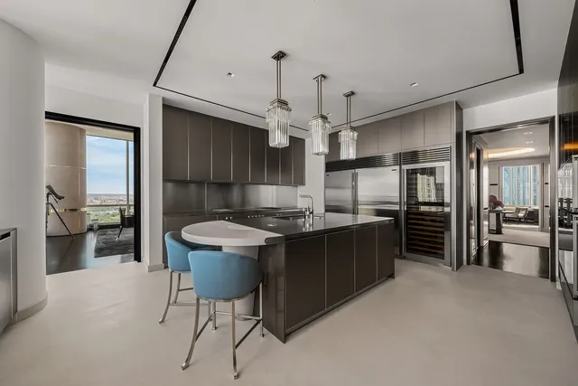 a room with furniture and flat screen tv