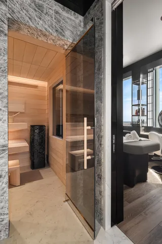 a kitchen with a sink and cabinets
