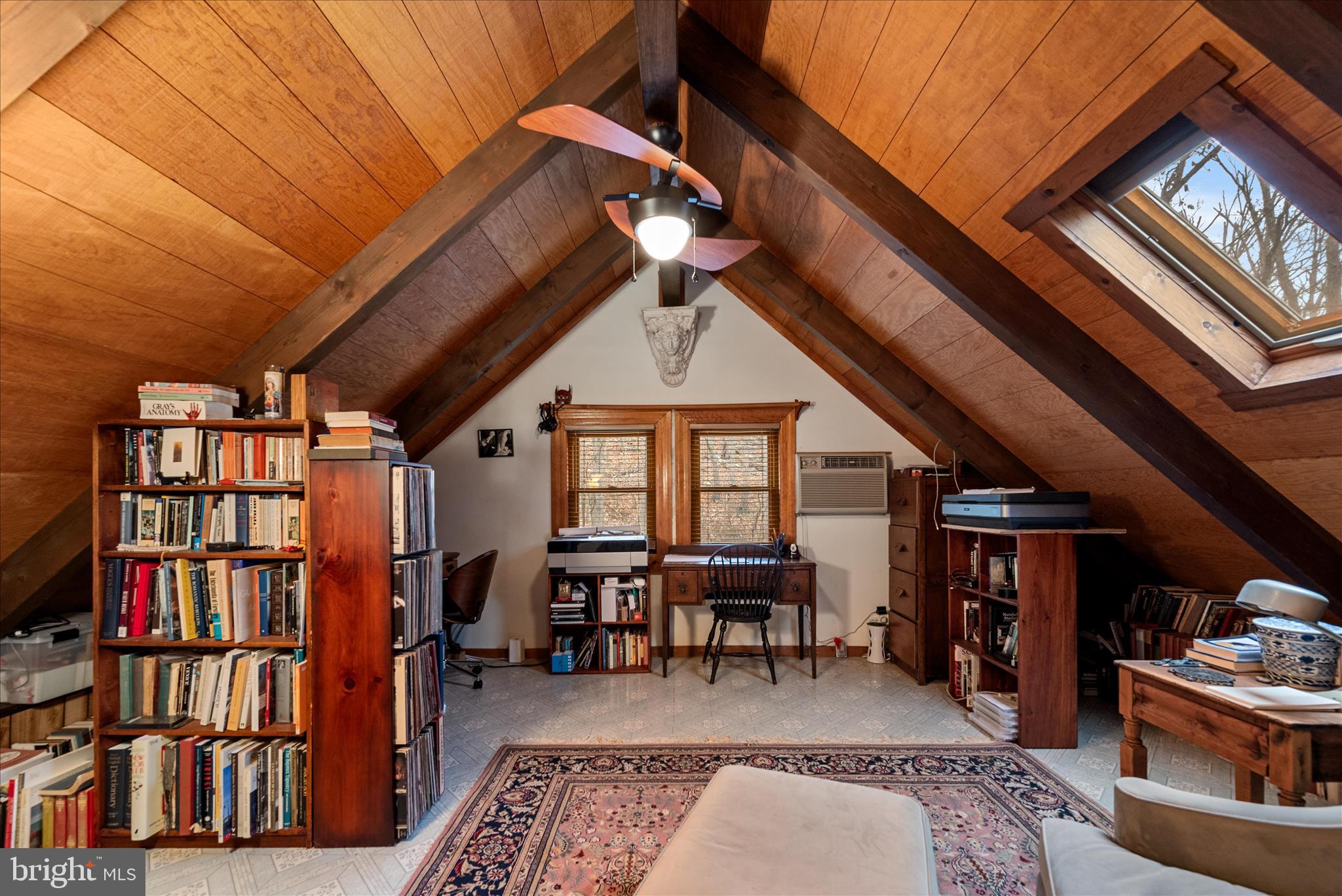 249 Crestview Lane Berkeley Springs, WV 25411 - Photo 17 of 52 a view of a livingroom with furniture and workspace