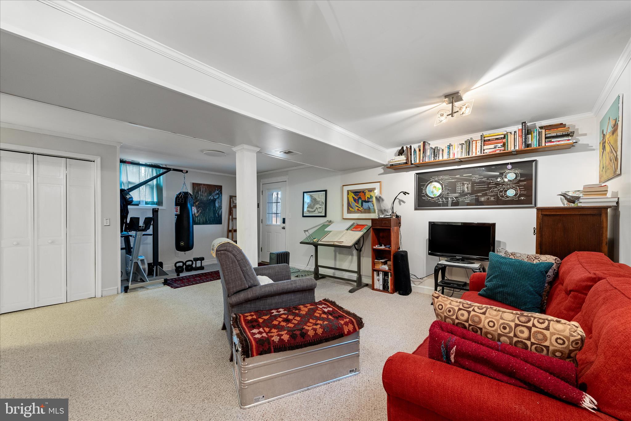 249 Crestview Lane Berkeley Springs, WV 25411 - Photo 22 of 52 a living room with furniture a fireplace and a flat screen tv