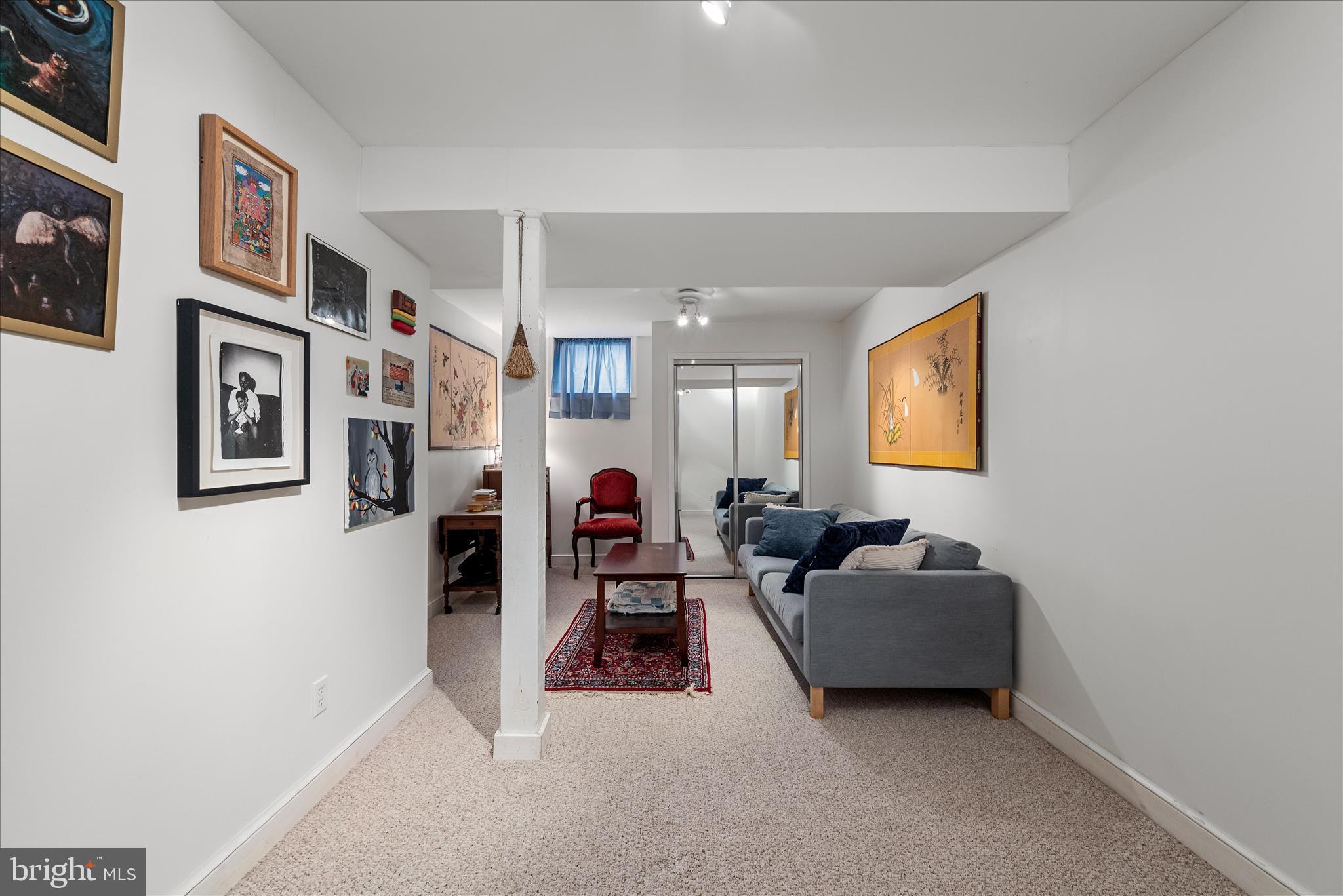 249 Crestview Lane Berkeley Springs, WV 25411 - Photo 27 of 52 a living room with furniture and a flat screen tv